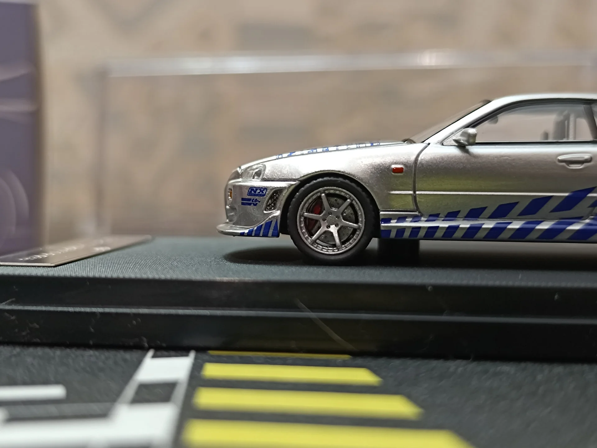 Nissan Skyline GT-R R34 C-West Imported 1:64 Scale - Image 3