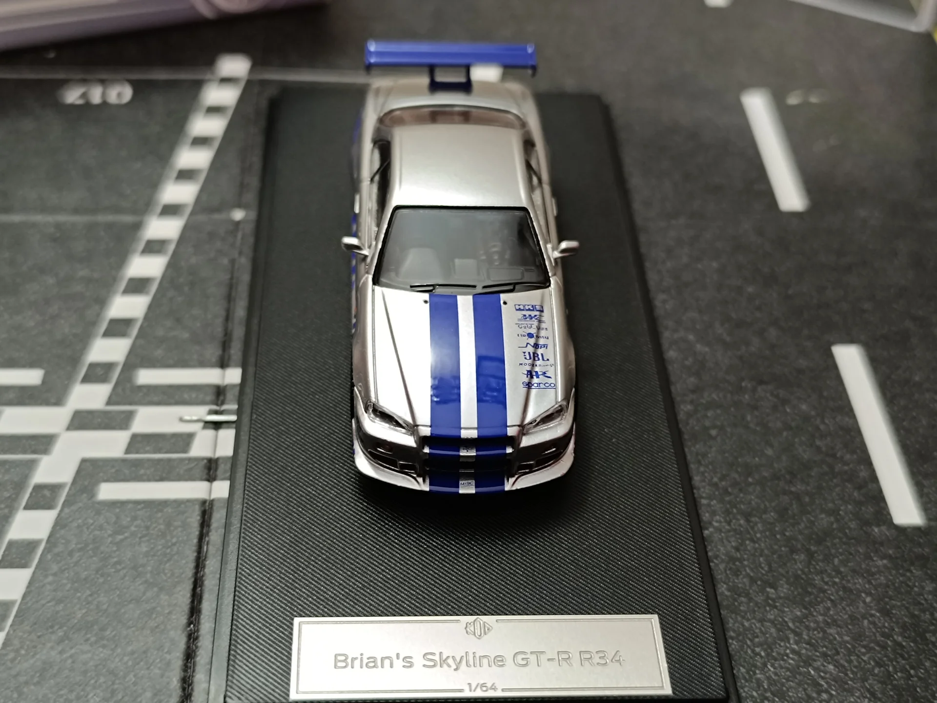 Nissan Skyline GT-R R34 C-West Imported 1:64 Scale - Image 9