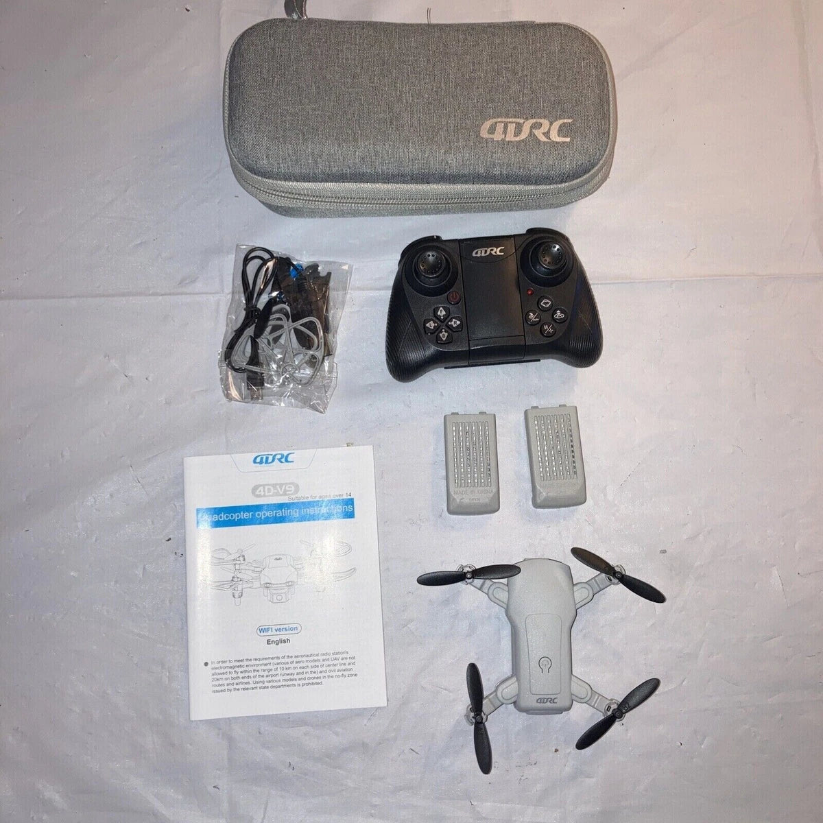 QDRC 4D-V9 Foldable WiFi Camera Drone with HD Camera, Remote Controller, Carry Case & USB Charging Cable - Image 4