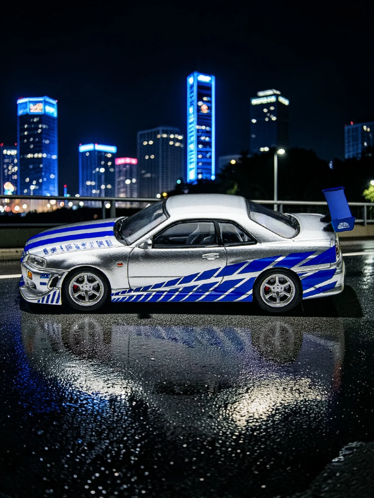 Timemicro Nissan Skyline GT-R R34 Premium Die-cast Collectible Car Model (Blue Stripe Edition) 1:64 Scale - Image 2